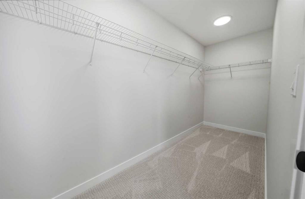 115 Crestview Boulevard, Sylvan Lake, AB - Indoor With Storage