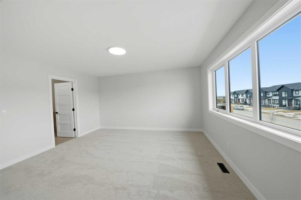 115 Crestview Boulevard, Sylvan Lake, AB - Indoor Photo Showing Other Room