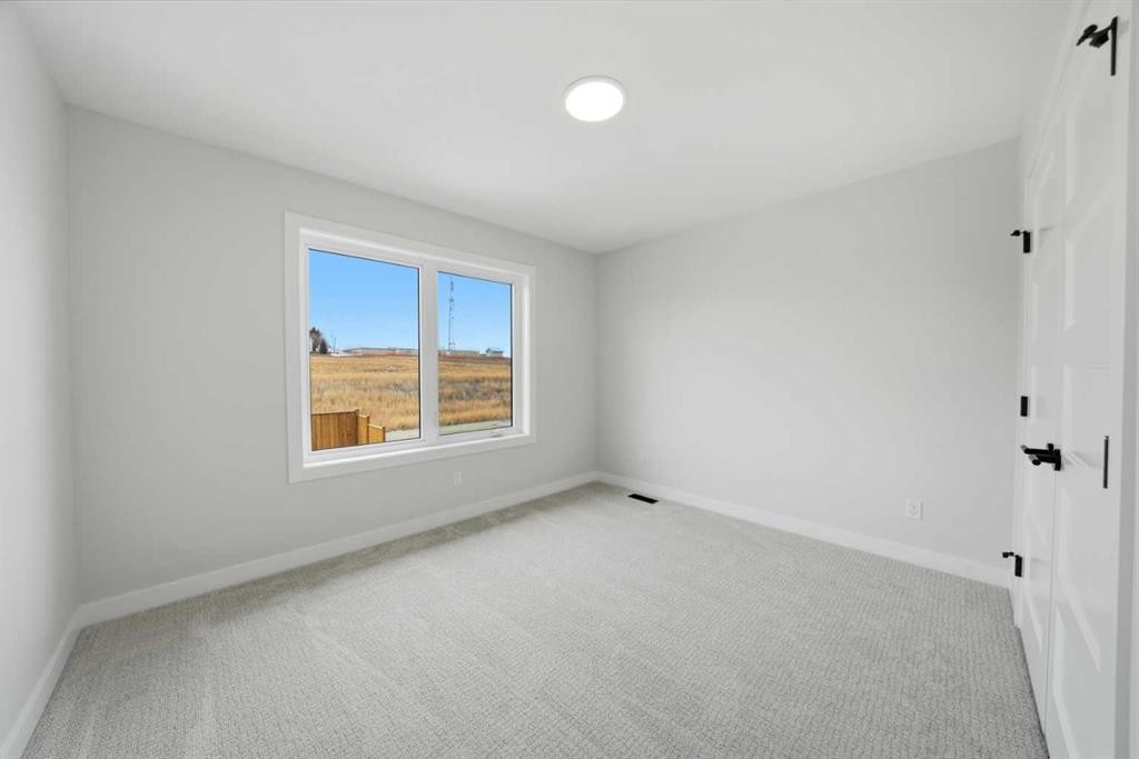 115 Crestview Boulevard, Sylvan Lake, AB - Indoor Photo Showing Other Room