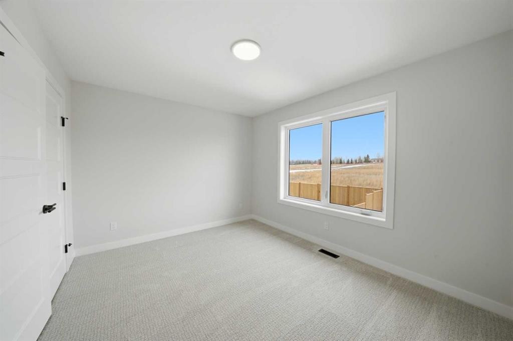 115 Crestview Boulevard, Sylvan Lake, AB - Indoor Photo Showing Other Room