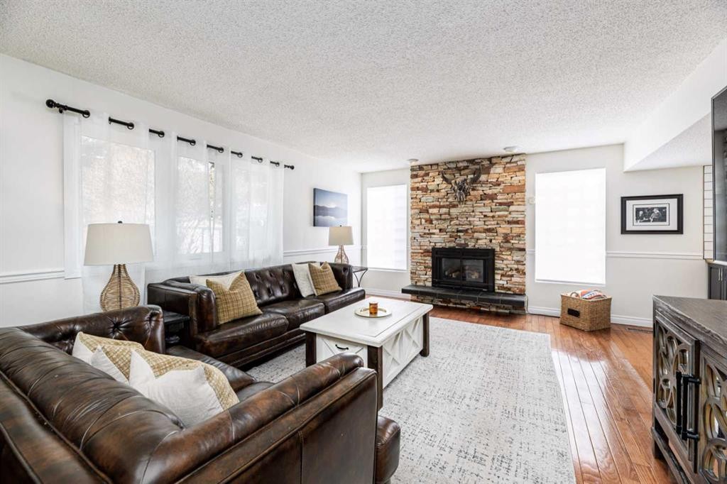 14 Warwick Drive, Red Deer, AB - Indoor Photo Showing Living Room With Fireplace