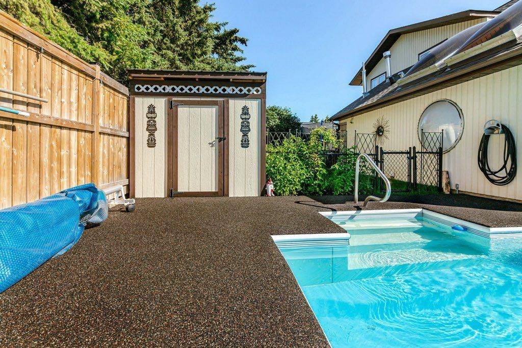 14 Warwick Drive, Red Deer, AB - Outdoor With In Ground Pool