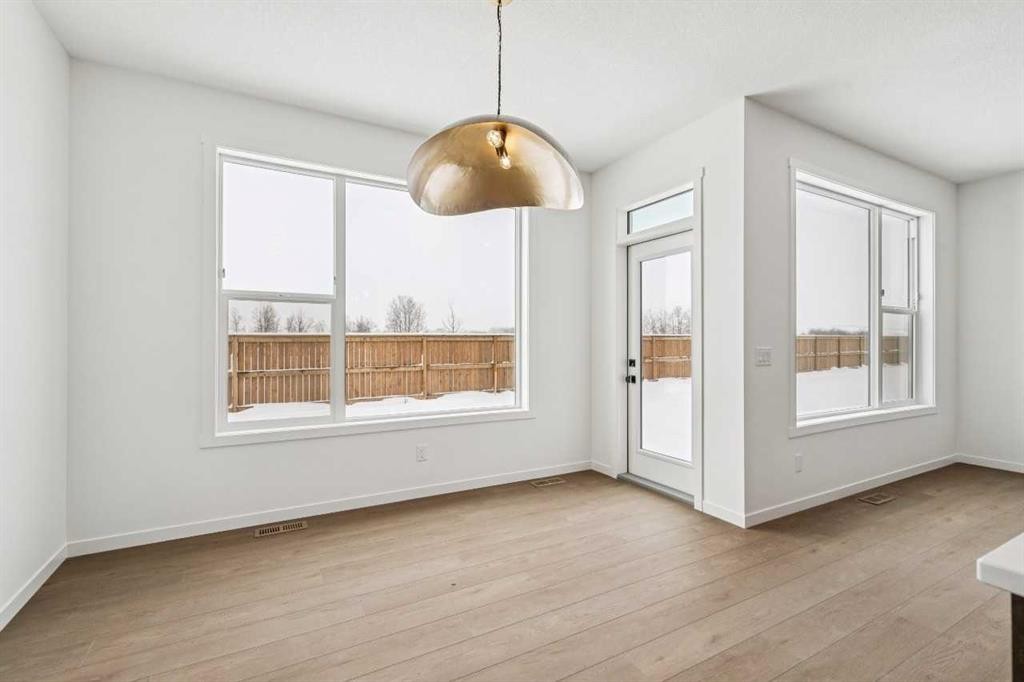 208 Southborough Common, Cochrane, AB - Indoor Photo Showing Other Room