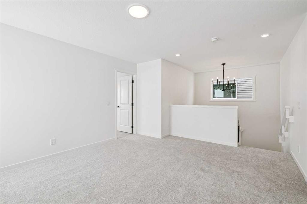 208 Southborough Common, Cochrane, AB - Indoor Photo Showing Other Room