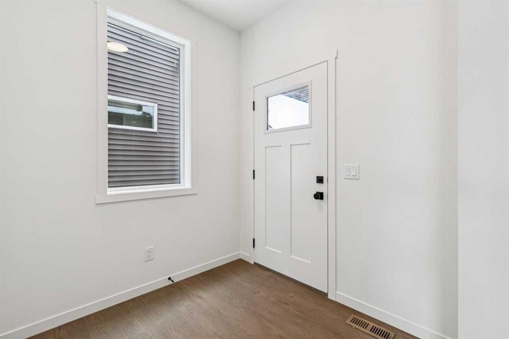 208 Southborough Common, Cochrane, AB - Indoor Photo Showing Other Room