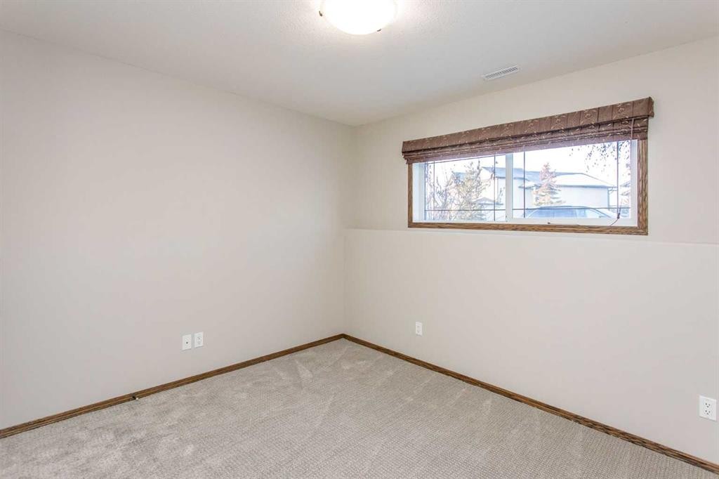 92 Iron Wolf Boulevard, Lacombe, AB - Indoor Photo Showing Other Room