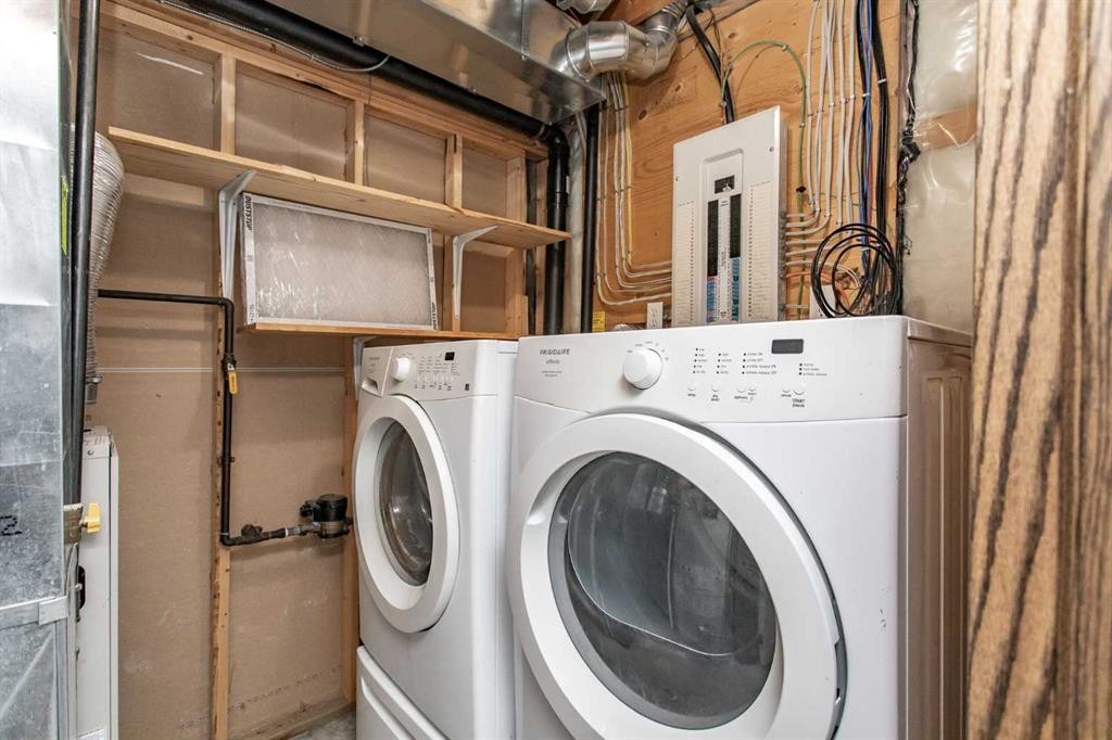 92 Iron Wolf Boulevard, Lacombe, AB - Indoor Photo Showing Laundry Room