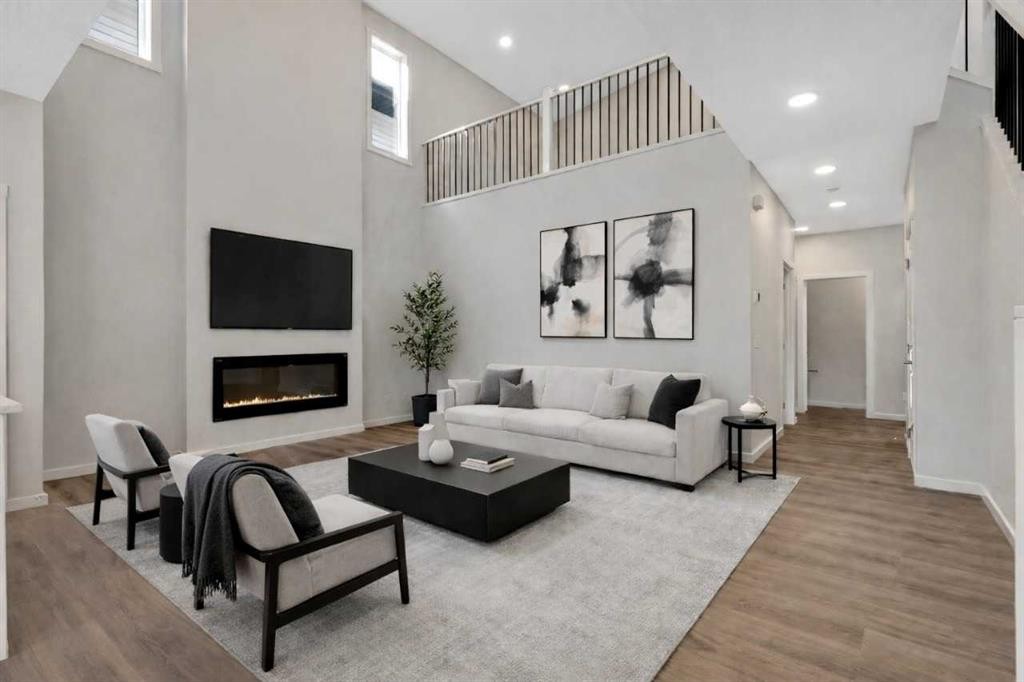 3 Heritage Link, Cochrane, AB - Indoor Photo Showing Living Room With Fireplace