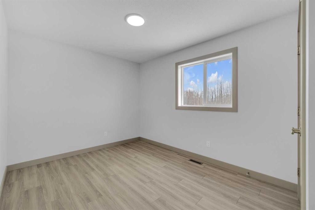 13 Vanson Close, Sylvan Lake, AB - Indoor Photo Showing Other Room