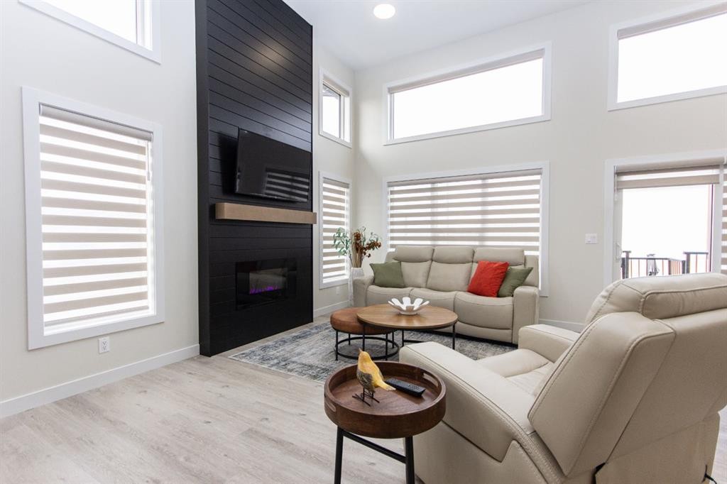224 Emerald Drive, Red Deer, AB - Indoor Photo Showing Living Room With Fireplace