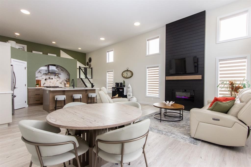 224 Emerald Drive, Red Deer, AB - Indoor Photo Showing Other Room With Fireplace