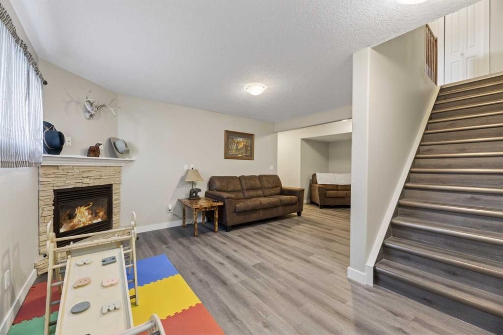 1 Destiny Way, Olds, AB - Indoor With Fireplace