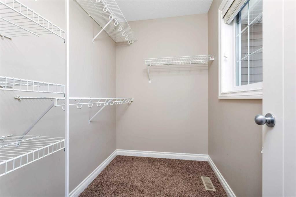 8 Ross Close, Sylvan Lake, AB - Indoor With Storage