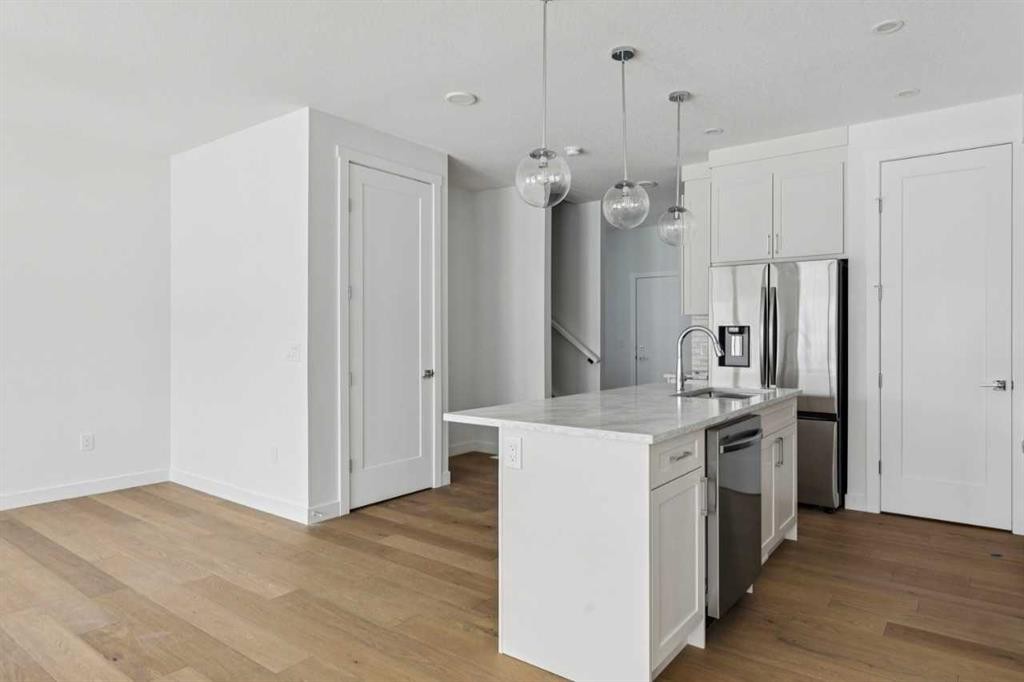 25 Linden Place, Rural Red Deer County, AB - Indoor Photo Showing Kitchen With Upgraded Kitchen