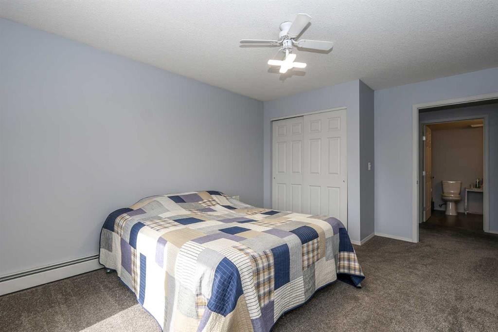 312-80A Kelloway Crescent, Red Deer, AB - Indoor Photo Showing Bedroom
