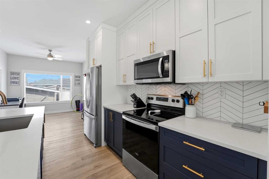 44 Evergreen Way, Red Deer, AB - Indoor Photo Showing Kitchen With Stainless Steel Kitchen With Double Sink With Upgraded Kitchen