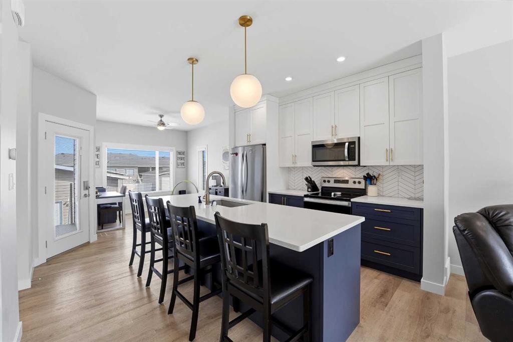 44 Evergreen Way, Red Deer, AB - Indoor Photo Showing Kitchen With Stainless Steel Kitchen With Upgraded Kitchen