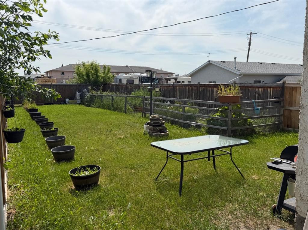 6403A 49 Avenue, Camrose, AB - Outdoor With Backyard