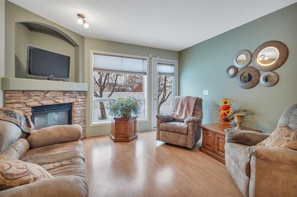 6 Jenkins Drive, Red Deer, AB - Indoor Photo Showing Living Room With Fireplace