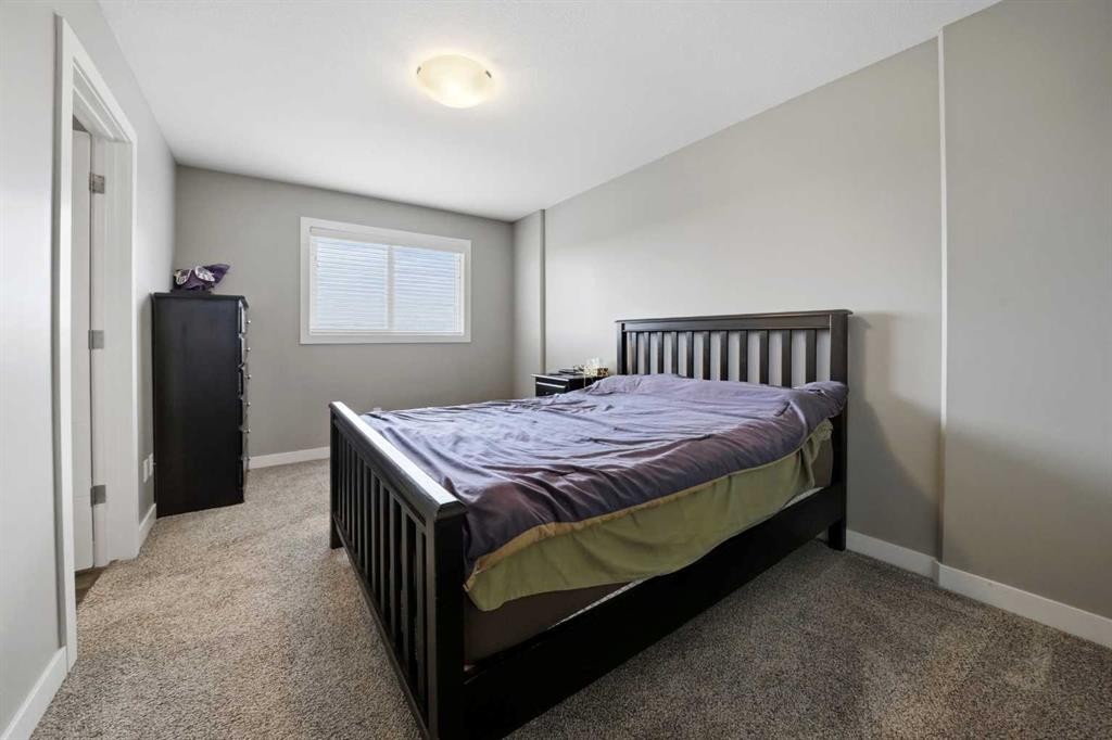 71 Palmer Circle, Blackfalds, AB - Indoor Photo Showing Bedroom