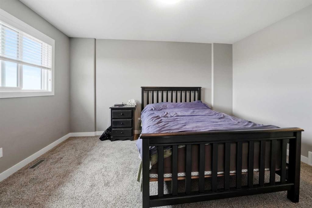 71 Palmer Circle, Blackfalds, AB - Indoor Photo Showing Bedroom