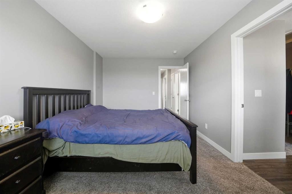 71 Palmer Circle, Blackfalds, AB - Indoor Photo Showing Bedroom