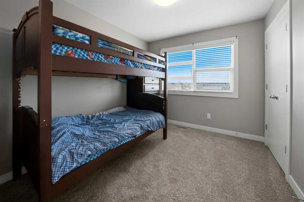 71 Palmer Circle, Blackfalds, AB - Indoor Photo Showing Bedroom