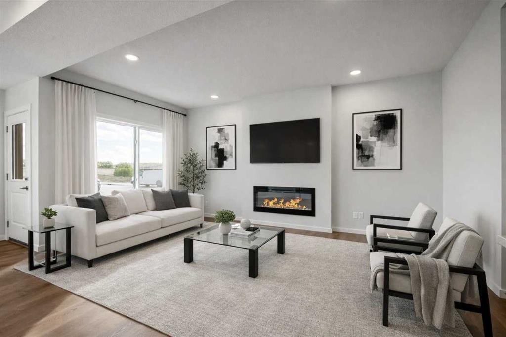 27 Heritage Link, Cochrane, AB - Indoor Photo Showing Living Room With Fireplace