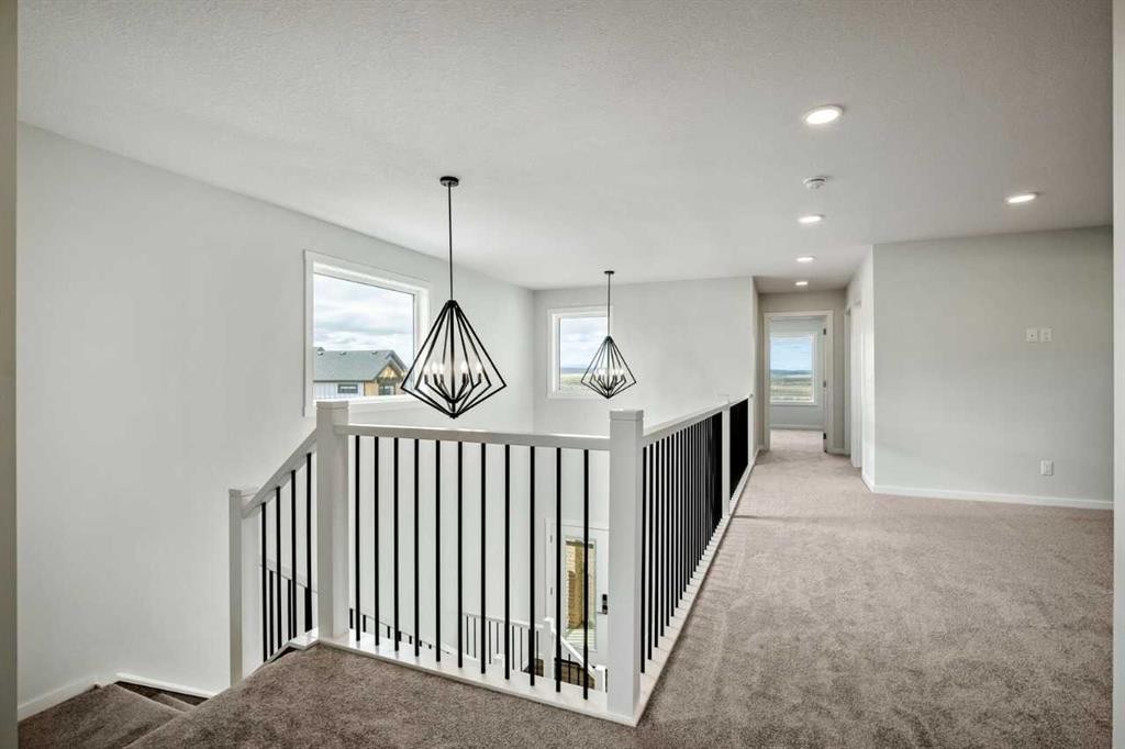 27 Heritage Link, Cochrane, AB - Indoor Photo Showing Other Room