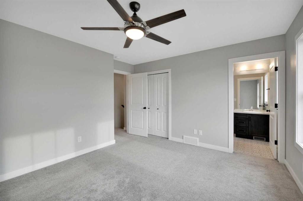 15 Iron Gate Boulevard, Sylvan Lake, AB - Indoor Photo Showing Other Room