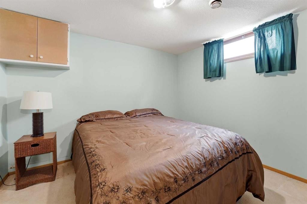 69 Wright Avenue, Red Deer, AB - Indoor Photo Showing Bedroom