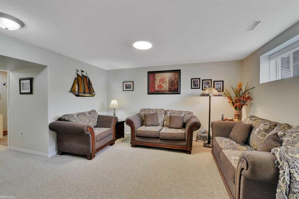 47 Abel Close, Red Deer, AB - Indoor Photo Showing Living Room