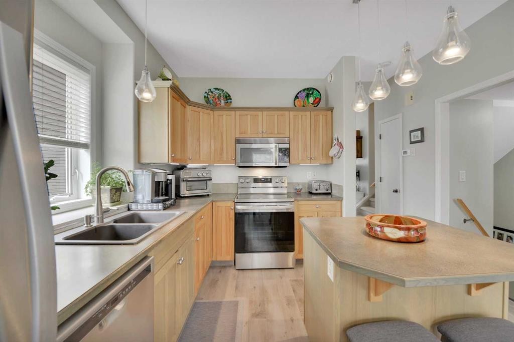 47 Abel Close, Red Deer, AB - Indoor Photo Showing Kitchen With Double Sink