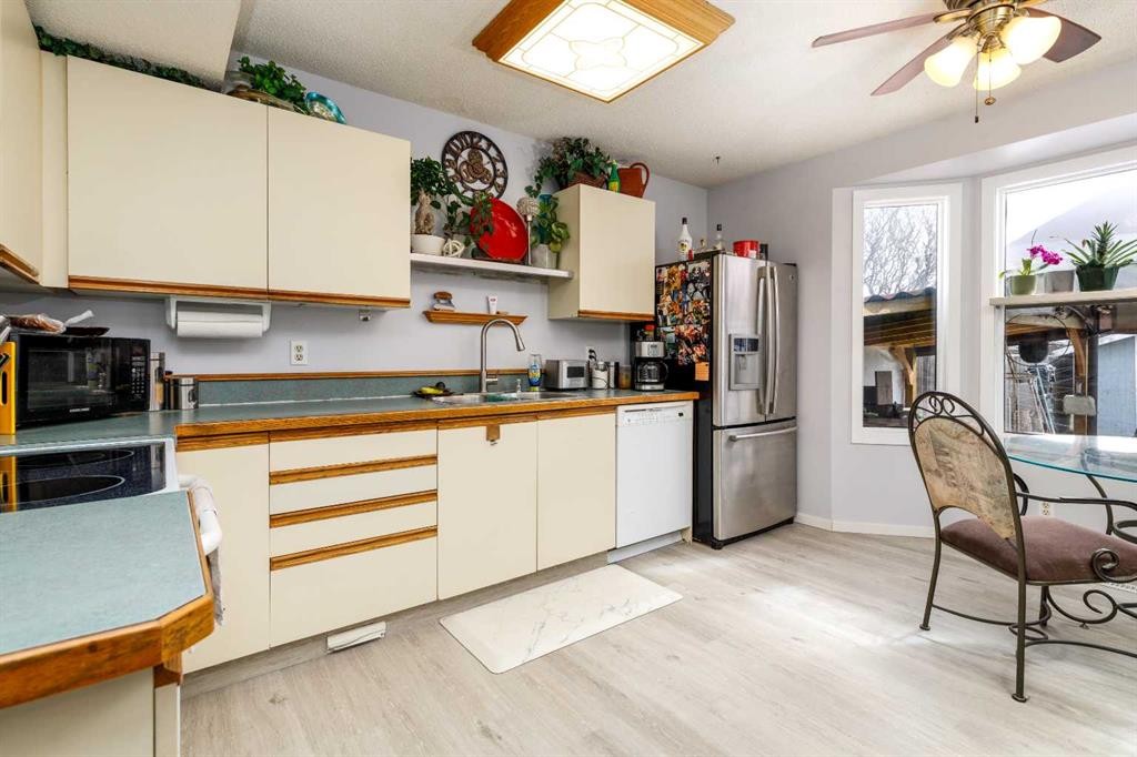 27 Kovac, Red Deer, AB - Indoor Photo Showing Kitchen With Double Sink