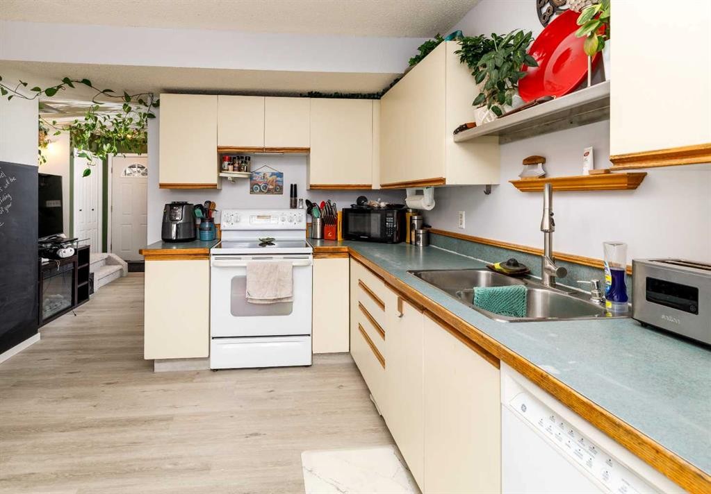 27 Kovac, Red Deer, AB - Indoor Photo Showing Kitchen With Double Sink