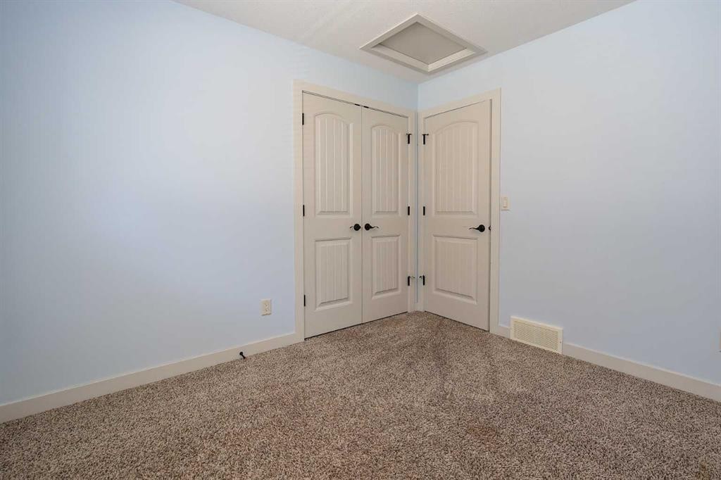 85 Cedar Crescent, Blackfalds, AB - Indoor Photo Showing Other Room