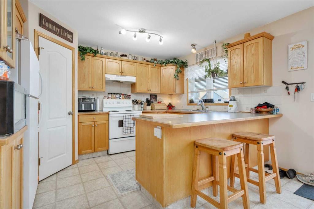 6205 Orr Drive, Red Deer, AB - Indoor Photo Showing Kitchen With Double Sink
