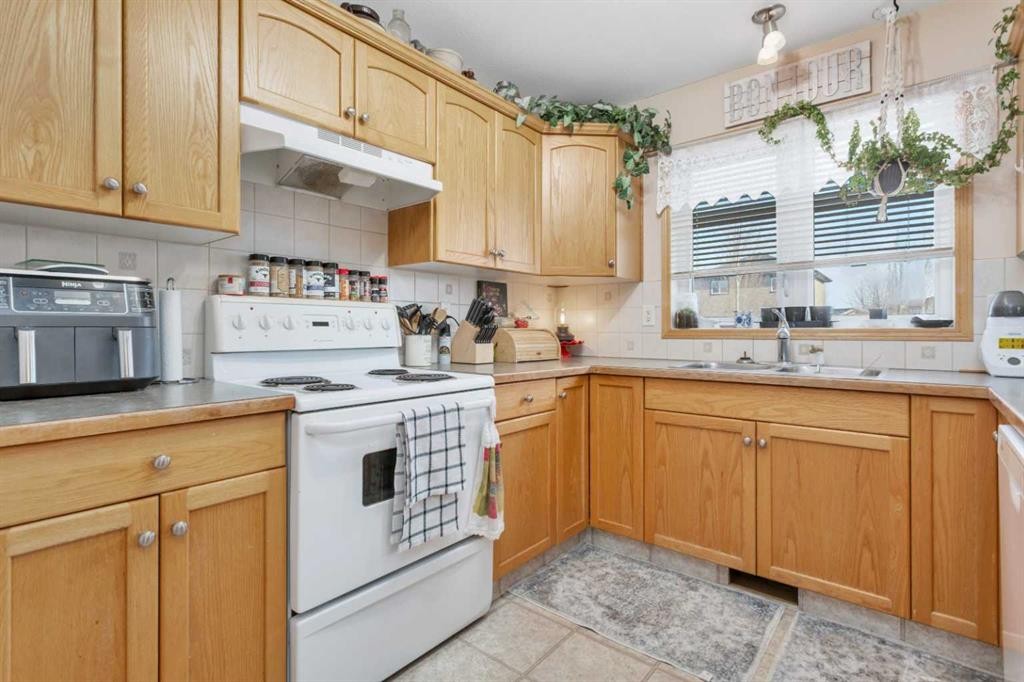 6205 Orr Drive, Red Deer, AB - Indoor Photo Showing Kitchen With Double Sink
