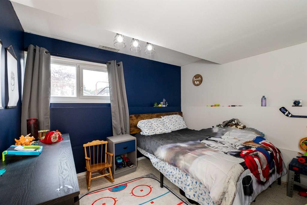 62 Rupert Crescent, Red Deer, AB - Indoor Photo Showing Bedroom