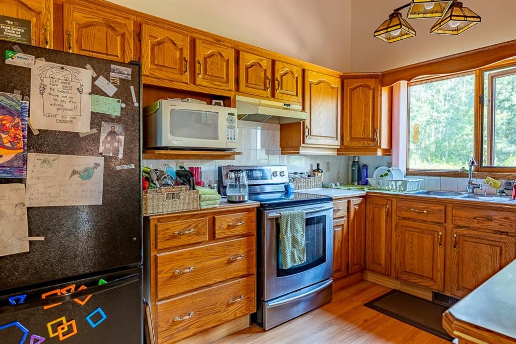 Sunhaven Road, Rural Lacombe County, AB - Indoor Photo Showing Kitchen With Double Sink
