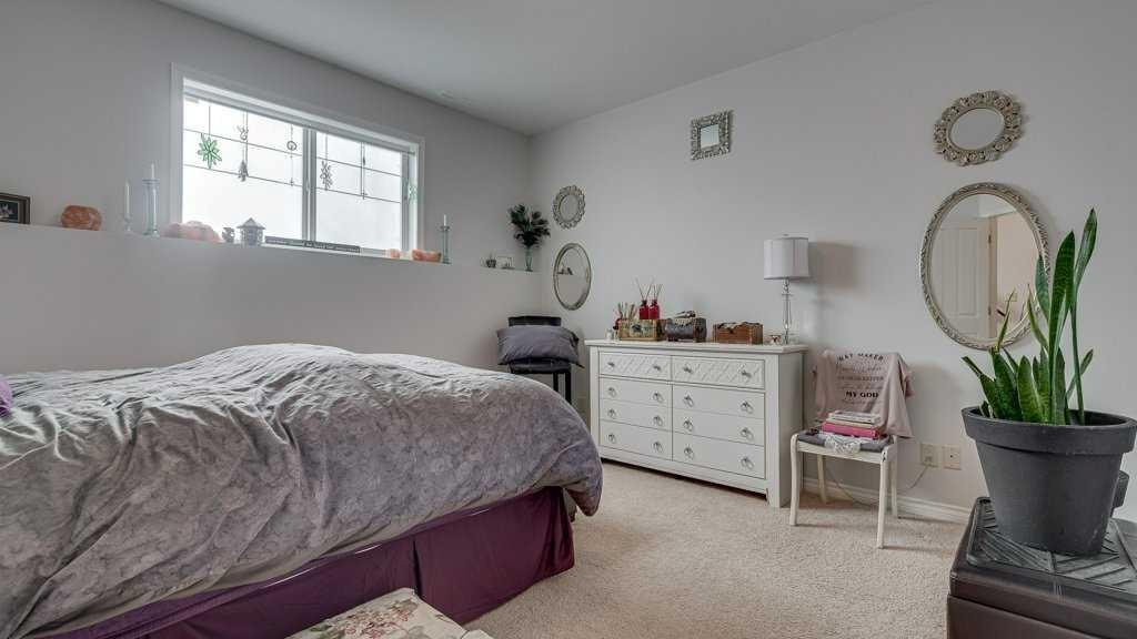 115 Redwood Boulevard, Springbrook, AB - Indoor Photo Showing Bedroom