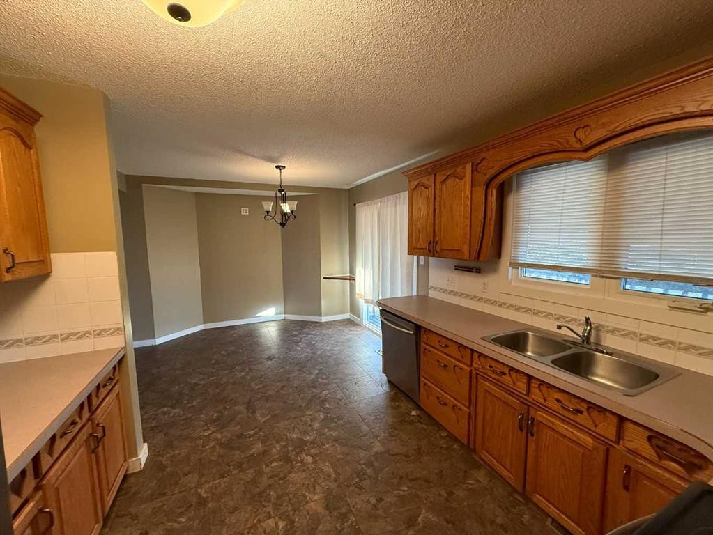 5805 42 Avenue, Camrose, AB - Indoor Photo Showing Kitchen With Double Sink