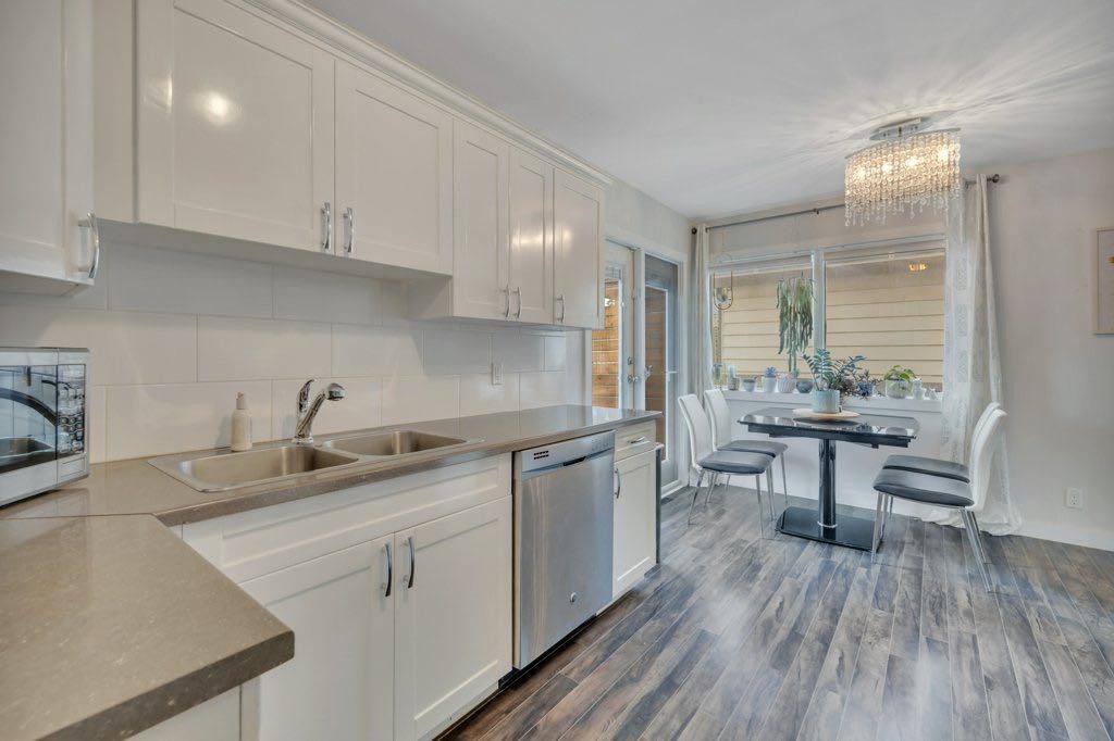 7715 73 Avenue Nw, Edmonton, AB - Indoor Photo Showing Kitchen With Stainless Steel Kitchen With Double Sink