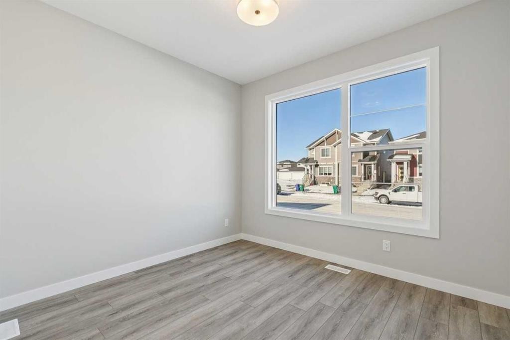 335 Fireside Drive, Cochrane, AB - Indoor Photo Showing Other Room