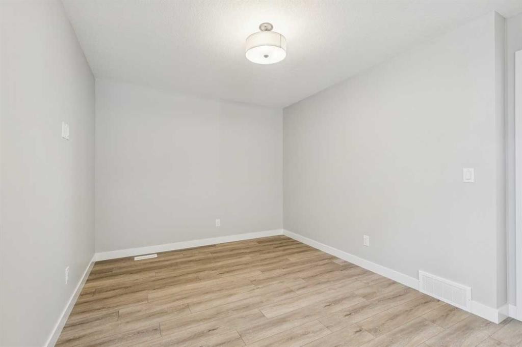 335 Fireside Drive, Cochrane, AB - Indoor Photo Showing Other Room