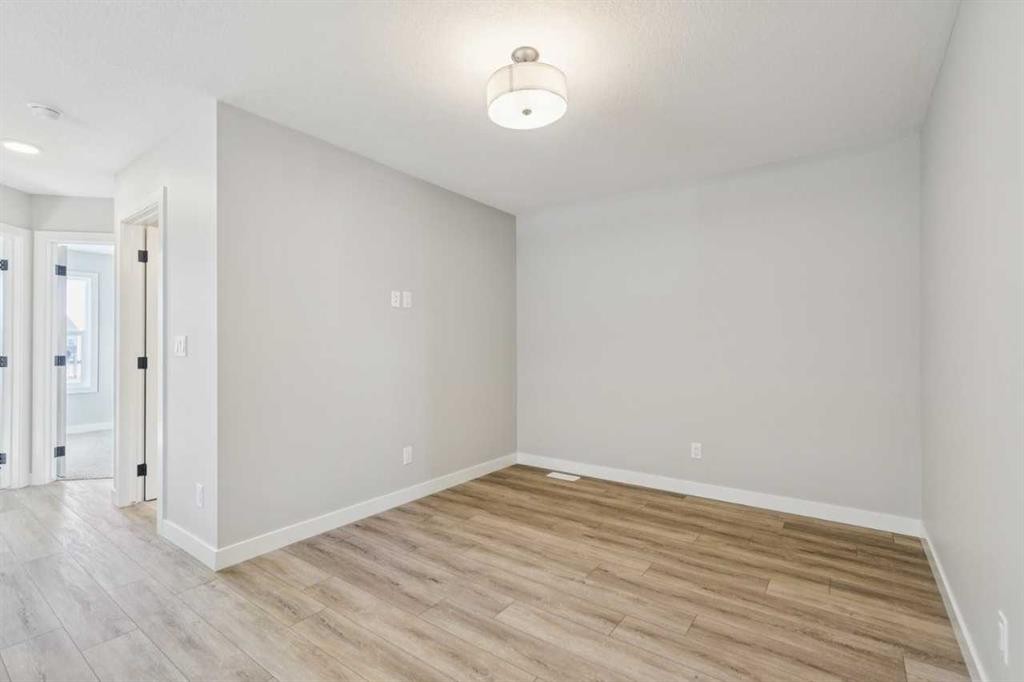 335 Fireside Drive, Cochrane, AB - Indoor Photo Showing Other Room