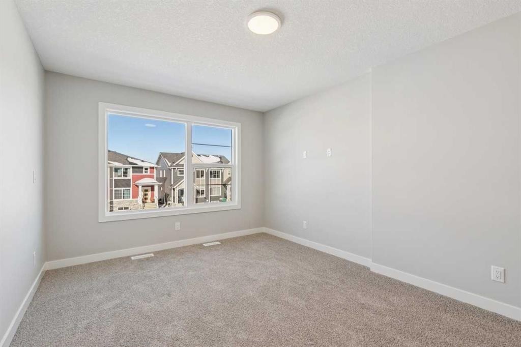 335 Fireside Drive, Cochrane, AB - Indoor Photo Showing Other Room