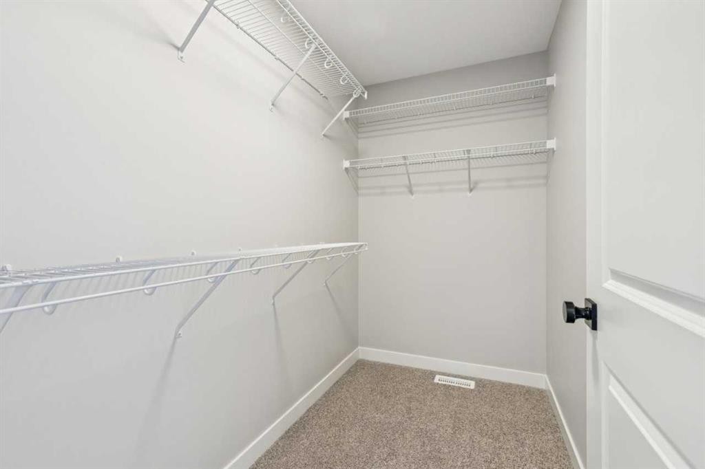 335 Fireside Drive, Cochrane, AB - Indoor With Storage