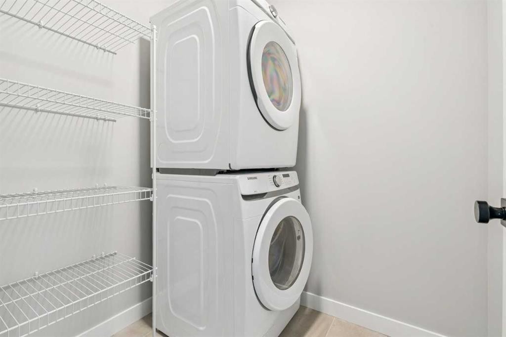 335 Fireside Drive, Cochrane, AB - Indoor Photo Showing Laundry Room