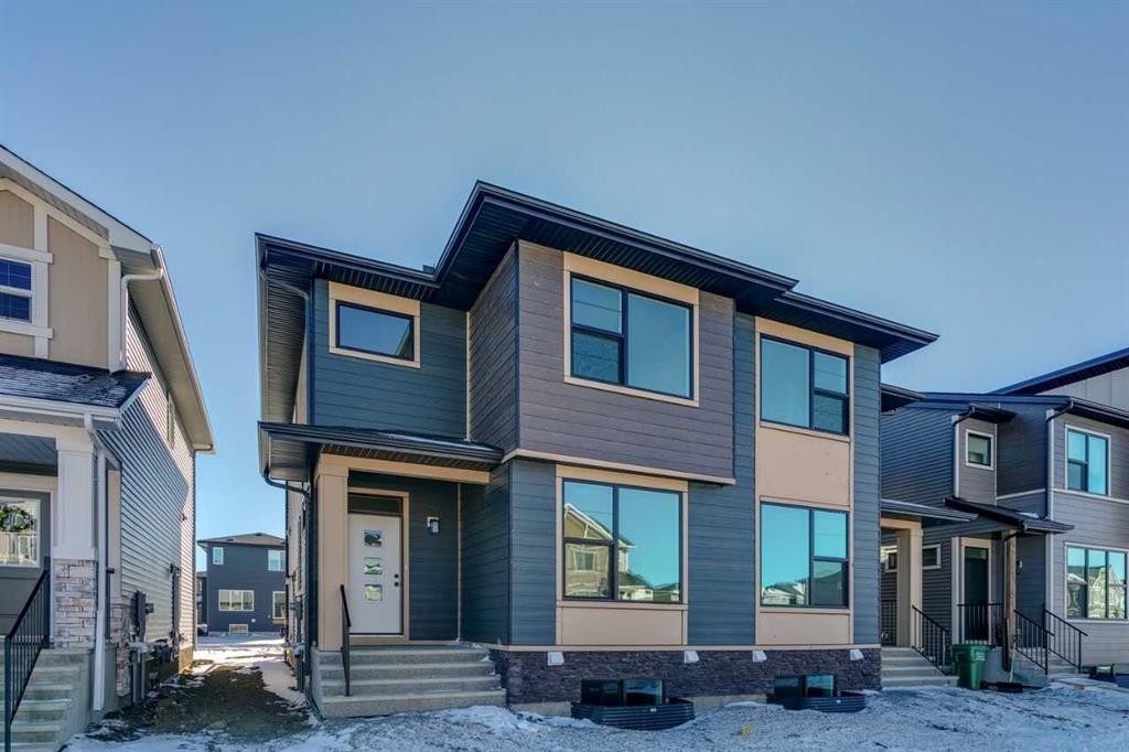 335 Fireside Drive, Cochrane, AB - Outdoor With Facade